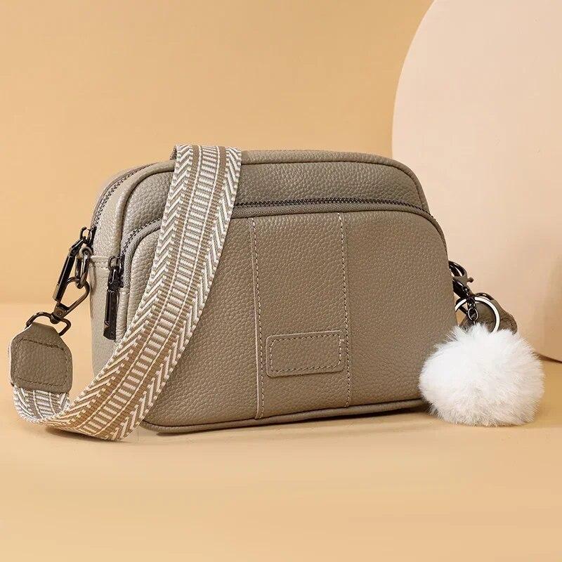RUWB BAGS Lederen Messenger Bag Damesmode Stijl Vrouwelijke handtas met brede schouderband Luxe haarbol Crossbody Sac 21cm 8cm 15cm zwart