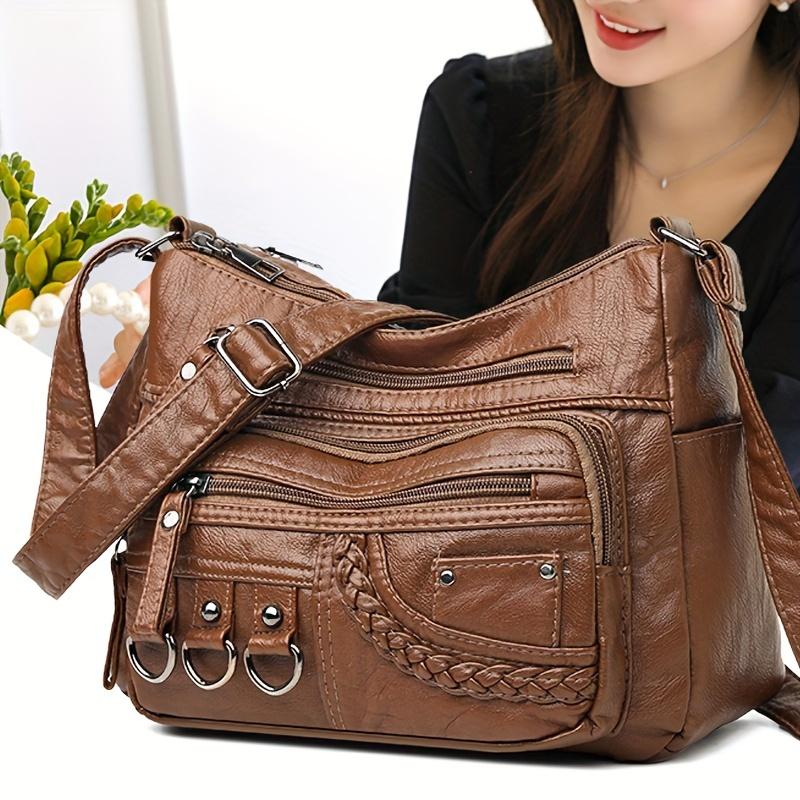 RUWB BAGS Grote capaciteit zachte leren schoudertas voor dames Casual crossbody-portemonnee met willekeurige bloemenversieringen Meerdere zakken Gevlochten accenten bruin