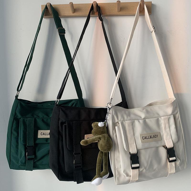 Dream shoe edge mode 2024 Canvas Crossbody Tassen Jeugd Mode Casual Grote Capaciteit Dames Schoudertas Effen Kleur Vrouwen Messenger Bags met Hanger donkergroene kleur