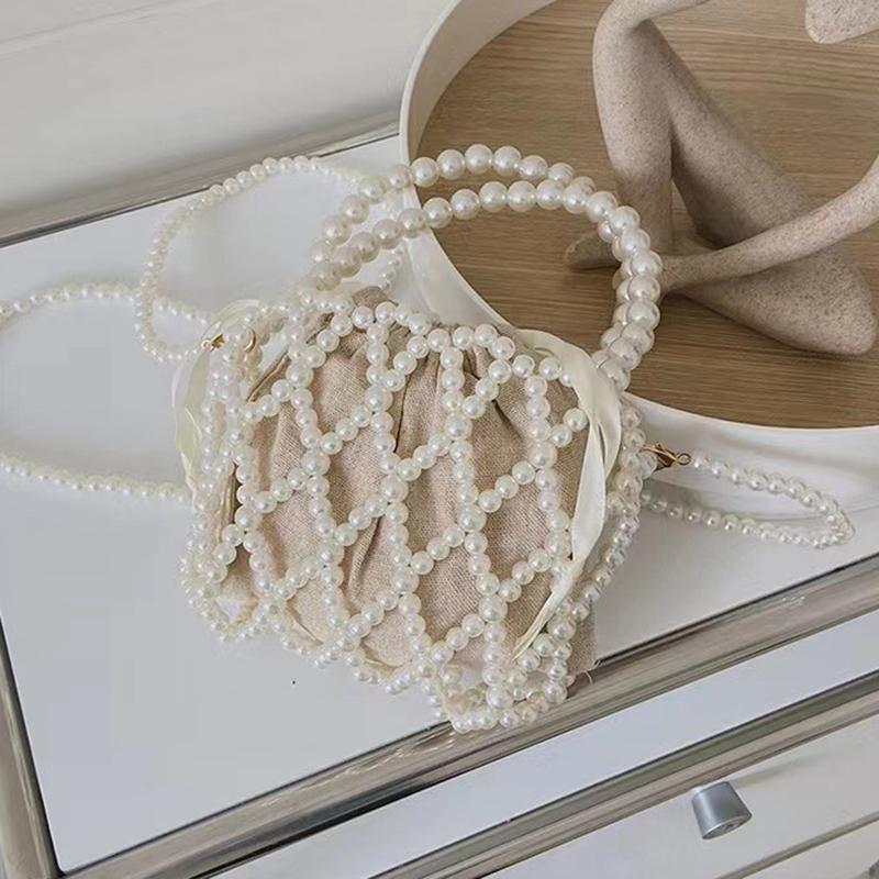 NK39UR Franse Retro Handtas Fee Geweven Kralen Emmer Tas Crossbody Tas Zomer Niche Ontwerp Uitgeholde Parel Tas 15x13cm wit