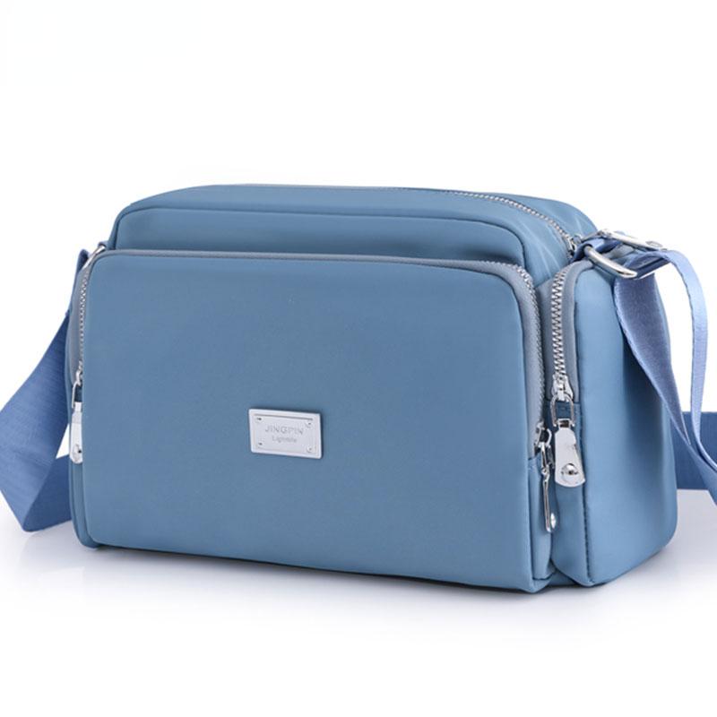 RUWB BAGS Damestas Waterdichte nylon handtassen Pure kleur Mode Multifunctioneel Crossbody draagtas met grote capaciteit Casual Messenger Mum Bag blauw