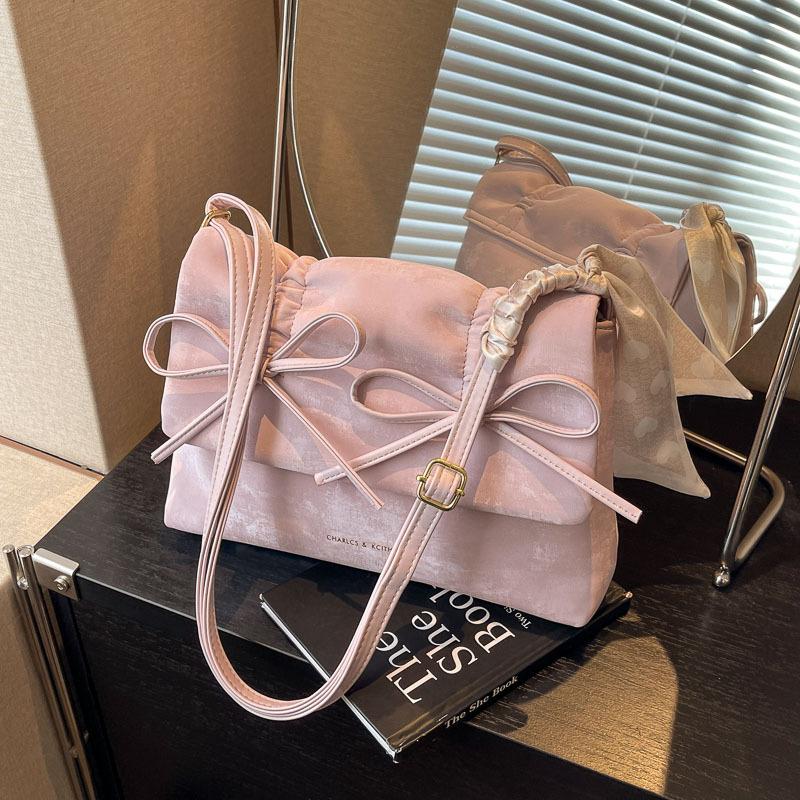 KULUOSIDI BAG Kleine vierkante tas met strik voor dames zwart