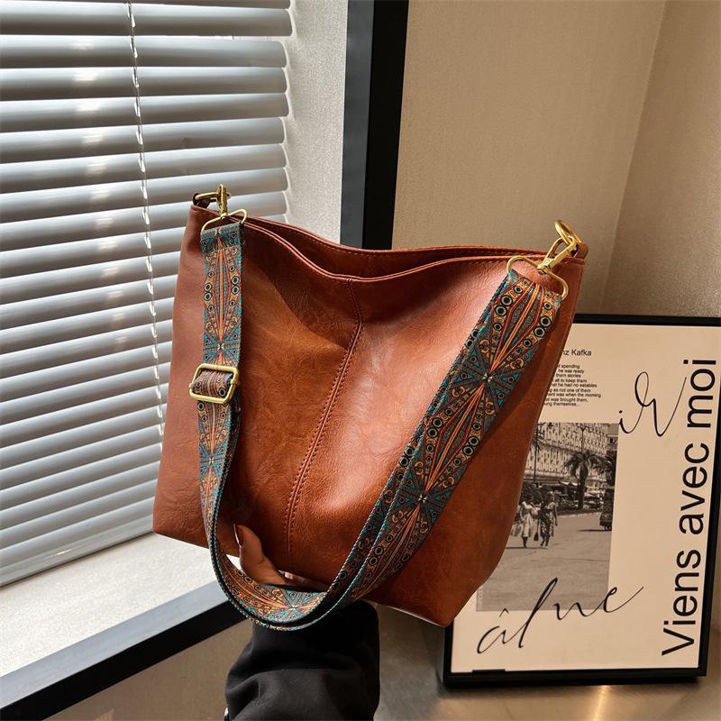 MOJOTO Vintage effen kleur PU leren damesmode schoudertas eenvoudige brede band emmer crossbody tas
