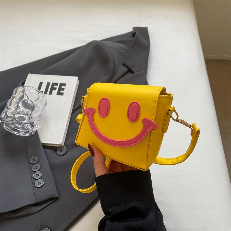 Framont Fashion House 2024 nieuwe niche schattige smiley gezicht creatieve contrasterende tas casual eenvoudige schoudertas kleine vierkante damestas geel
