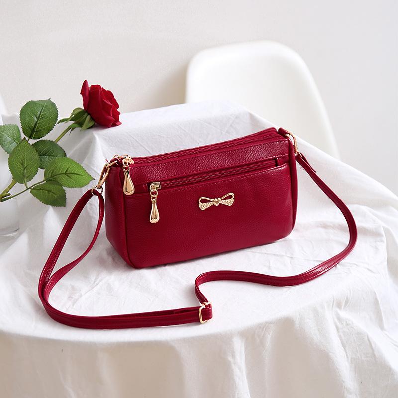 NK39UR Mode Kleine PU Leren Messenger Bags voor Vrouwen Strik Ontwerp Schoudertas 25x8x14cm wijnrode kleur