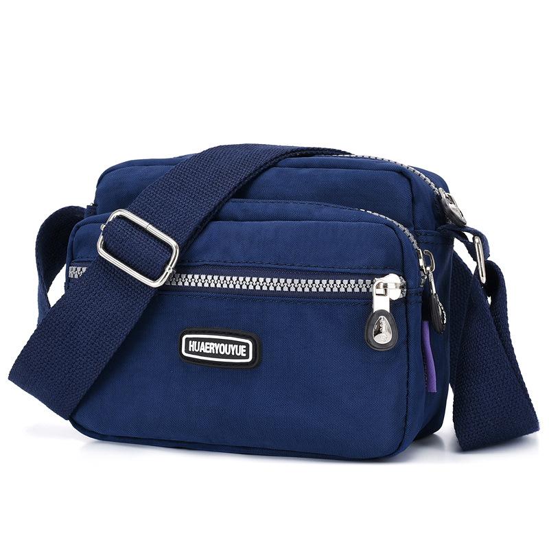 Yogodlns Vrouwen Waterdichte Nylon Schouder Messenger Bag Lichtgewicht Pakket Grote Capaciteit Casual Effen Kleur Reis Crossbody Tas Portemonnee 20x9x16cm marineblauwe kleur