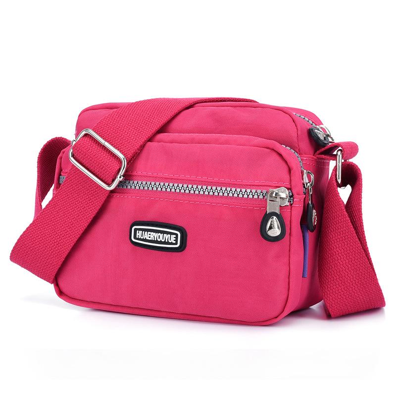 Yogodlns Vrouwen Waterdichte Nylon Schouder Messenger Bag Lichtgewicht Pakket Grote Capaciteit Casual Effen Kleur Reis Crossbody Tas Portemonnee 20x9x16cm warm roze kleur