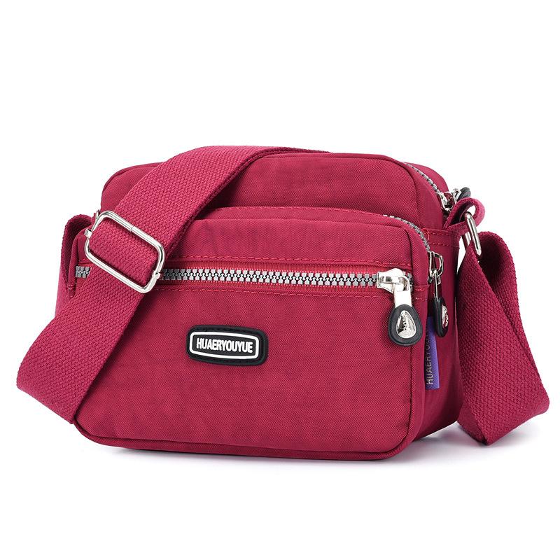 Yogodlns Vrouwen Waterdichte Nylon Schouder Messenger Bag Lichtgewicht Pakket Grote Capaciteit Casual Effen Kleur Reis Crossbody Tas Portemonnee 20x9x16cm pruim