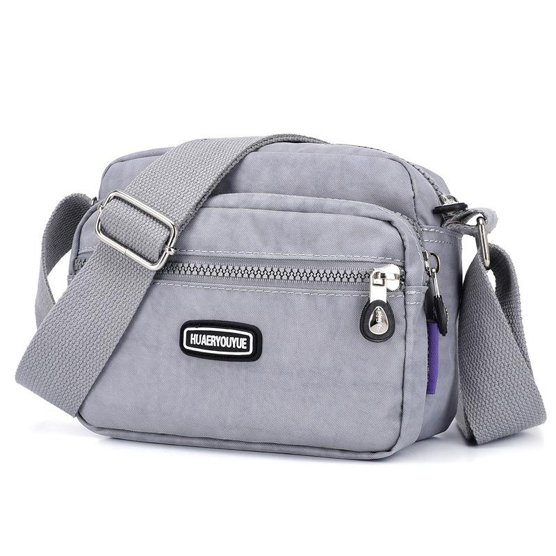 Yogodlns Vrouwen Waterdichte Nylon Schouder Messenger Bag Lichtgewicht Pakket Grote Capaciteit Casual Effen Kleur Reis Crossbody Tas Portemonnee 20x9x16cm grijze kleur