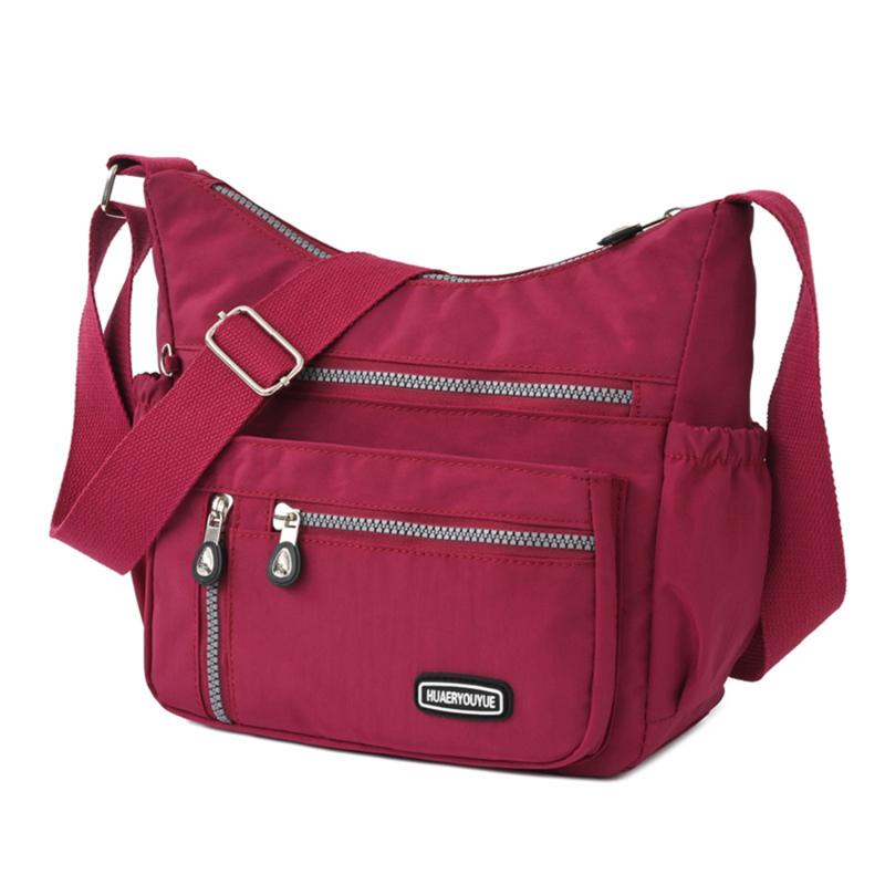 Your favorite bag Mode Casual Nylon Doek Messenger Bag Voor Vrouwen Schoudertassen Multi Layer Vrouwelijke Crossbody Tassen Waterdichte Moedertas Portemonnee rood