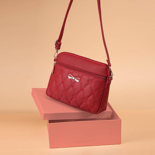 NK39UR Nieuwe collectie schoudertassen voor dames borduurwerk hart crossbody portemonnee vrouwelijke lederen handtas 26*18*7cm wijnrode kleur
