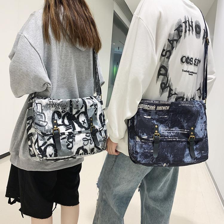 JINBAOSEN BAG Vrouwen Mannen Gepersonaliseerde Graffiti Schoudertas Mode Grote capaciteit Waterdichte Nylon Japanse Harajuku Print Cool Messenger Bag