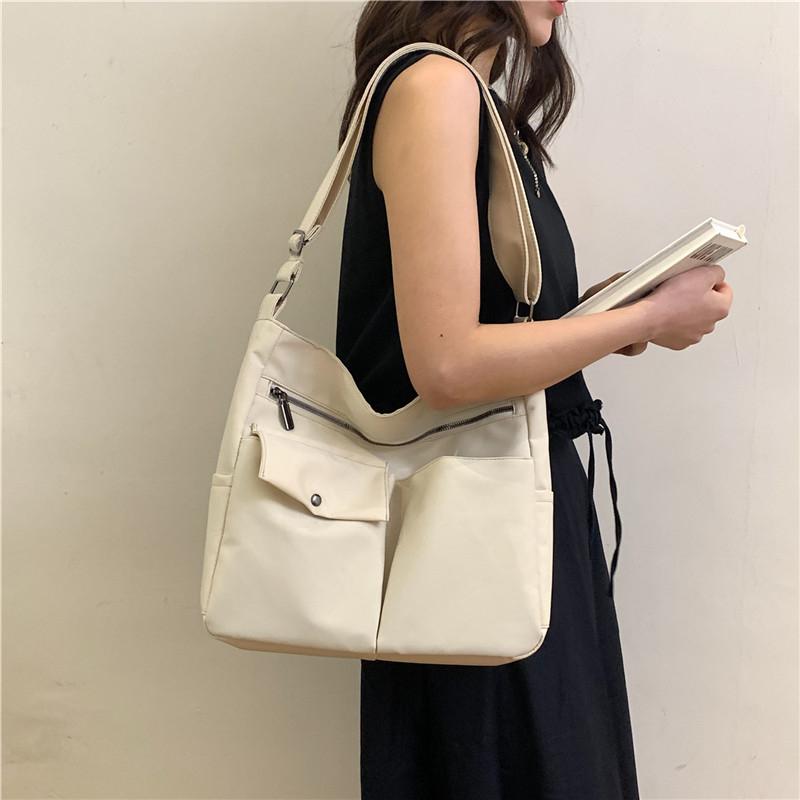 Kuluosidi Oxford-tas met meerdere zakken Vrouwelijke Crossbody-schoudertas Effen kleur Student-draagtas beige