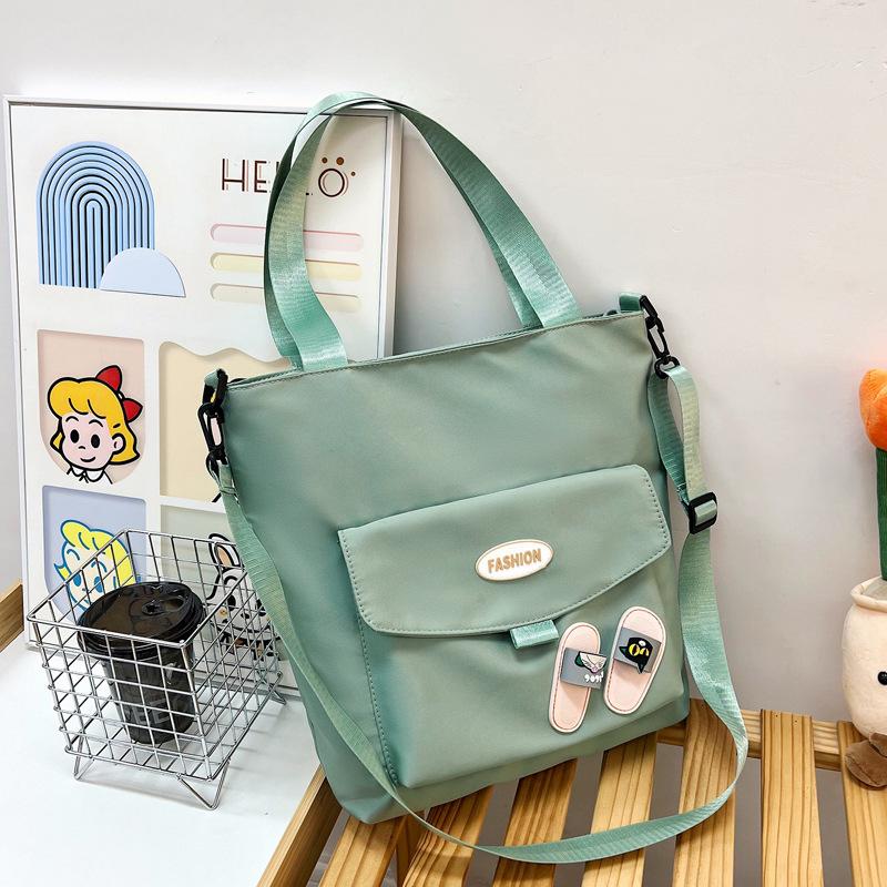 MOJOTO Nylon Handtassen Schoudertas Grote Capaciteit Crossbody Tassen voor Tiener Meisjes Mannen Harajuku Messenger Bag Student Schooltassen paars