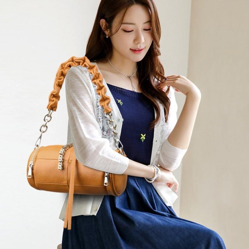 JINBAOSEN BAG Modieuze brede schouderband kleine tas 2024 zomer nieuwe damestas populaire veelzijdige crossbody tas populaire super hete cilindertas