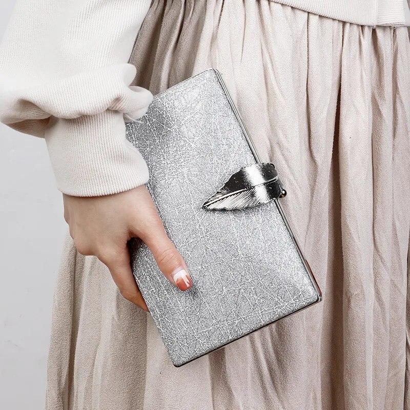 Enjoytime H Zilveren clutch luxe tassen dames hoge kwaliteit designer bruiloft portemonnee en handtassen bladvorm hasp telefoon crossbody tas 2024 nieuwe zilver