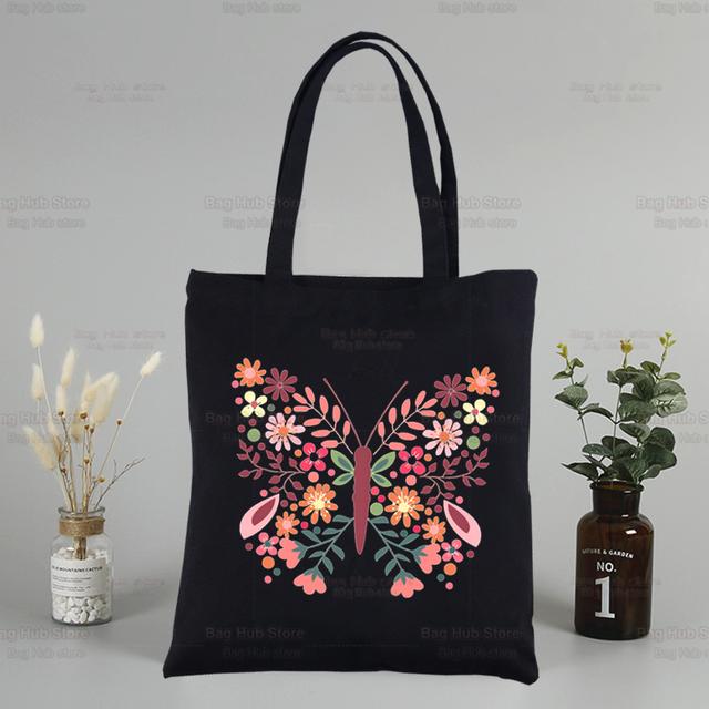 Iaidegou-2 Blauwe vlinderkleur vliegende bloem aangepaste tote tas winkelen origineel ontwerp zwarte unisex reis canvas tassen eco opvouwbare shopper 31*36cm