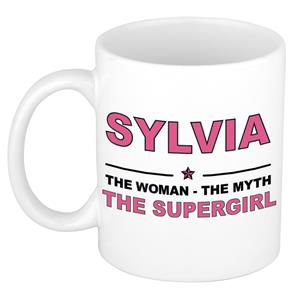 Bellatio Naam cadeau Sylvia - The woman, The myth the supergirl koffie mok / beker 300 ml - naam/namen mokken - Cadeau voor o.a verjaardag/ moederdag/ pensioen/ geslaagd/ bedankt