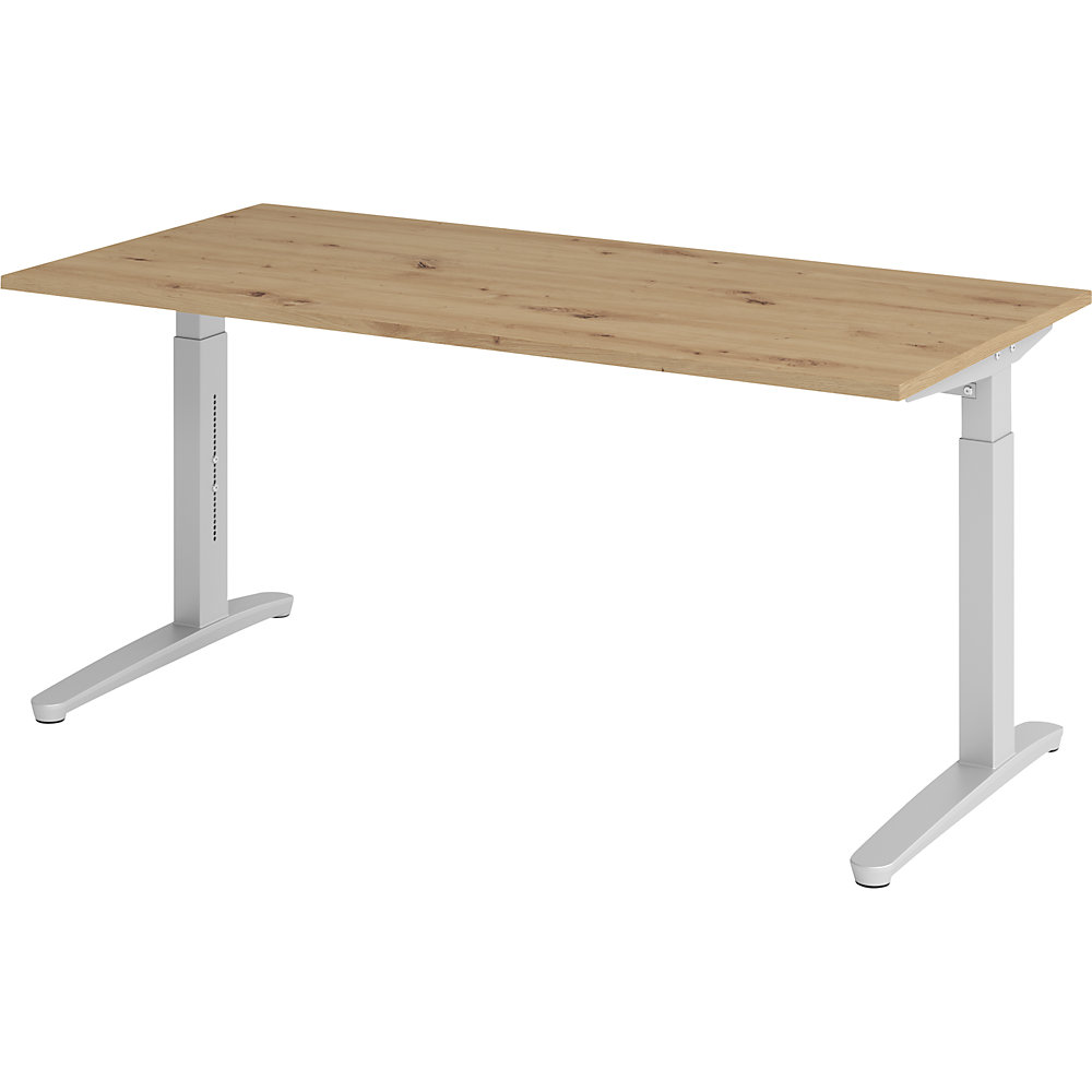 Eurokraft pro ANNY - Bureautafel met C-vormig onderstel, in hoogte verstelbaar 650 - 850 mm, breedte 1600 mm, eikenhout met noesten / aluminiumzilver