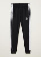 Adidas Superstar tapered fit trackpants met logo