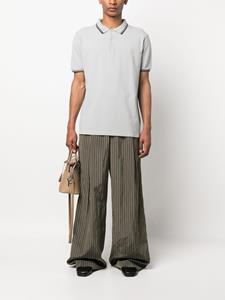 Maison Margiela Poloshirt met gestreepte afwerking - Grijs