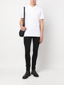 Alexander McQueen Poloshirt met doodskoppatch - Wit
