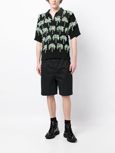 Jil Sander Poloshirt met palmboomprint - Zwart