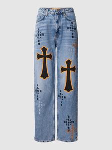 REVIEW Jeans met motiefprint