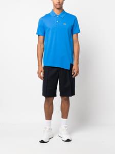 Comme Des Garçons Shirt x Lacoste asymmetric cotton polo shirt - Blauw