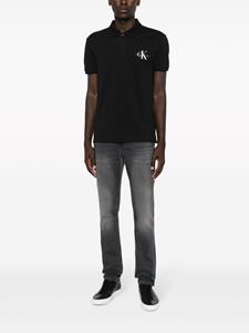 Calvin Klein Jeans logo-print cotton polo shirt - Zwart