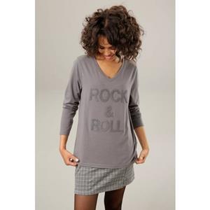 Aniston CASUAL Langarmshirt, mit "rockigem" Schriftzug aus strukturiertem Frottee - NEUE KOLLEKTION