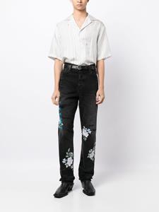 AMIRI Jeans met bloemenprint - Zwart
