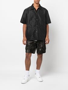 AMIRI Bermuda shorts met abstracte print - Zwart