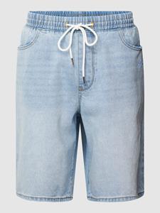 REVIEW Korte jeans met labelstitching