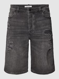 REVIEW Korte jeans in destroyed-look