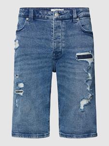REVIEW Korte jeans in destroyed-look