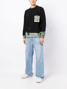 Stain Shade x Hiroshi Fujiwara sweater met tie-dye effect - Zwart
