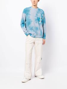 Stain Shade x Hiroshi Fujiwara sweater met tie-dye effect - Blauw
