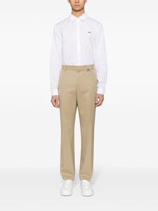 Lacoste logo-embroidered mid-rise chinos - Bruin