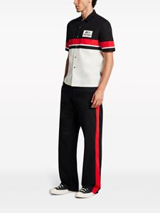 Palm Angels x MoneyGram Haas Racing stripe-detail trousers - Zwart