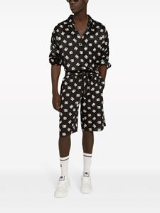 Dolce & Gabbana Bermuda shorts met monogramprint - Zwart