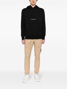 Calvin Klein Jeans Straight broek met elastische taille en logo-applicatie - Bruin