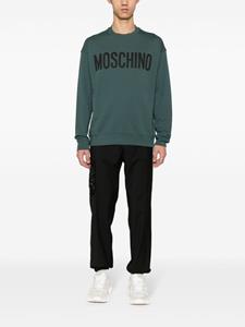 Moschino Sweater met logoprint - Groen