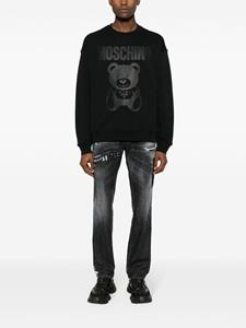 Moschino Katoenen sweater met print - Zwart