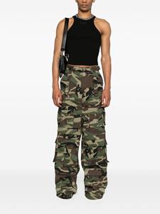 VETEMENTS camouflage-print wide-leg jeans - Groen