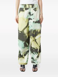 Closed camouflage-print cargo trousers - Groen
