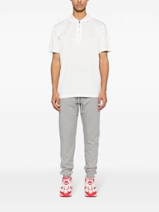 Moncler logo-embossed cotton polo shirt - Wit