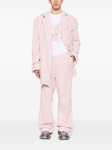 Martine Rose patterned-jacquard towelling trousers - Roze