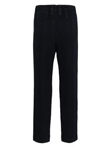 Homme Plissé Issey Miyake Basic tapered plissé trousers - Blauw