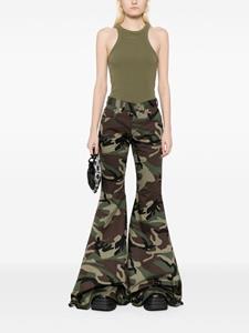 VETEMENTS camouflage-print flared trousers - Groen